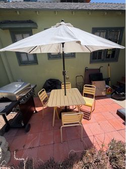 Novogratz patio table with chairs + umbrella