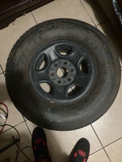 6 Lug Chevrolet Rim and Tire size 265/70R16 Firestone