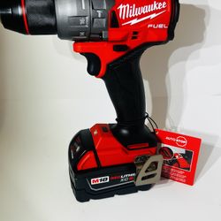 Milwaukee Hammer Drill With A 5.0 Battery 