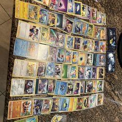 Lot Of Pokemon Cards And Key Chain