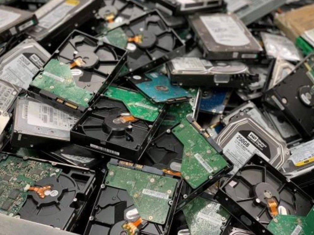 Harddrives are pulled from laptop and desktop.