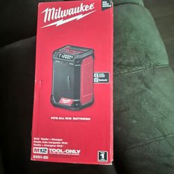 Milwaukee M12™️ Radio + Charger ( tool only ) battery not included