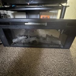 Plug In Fire Place Works Perfectly And Have A Speaker On Sides