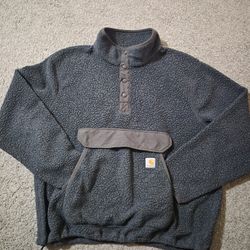 Carhartt Fleece Pullover in a dark gray Almost Black color. 
