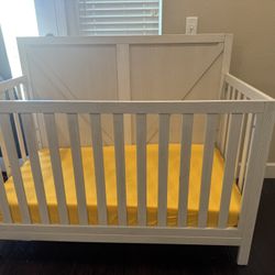 Suite babe 4-in-1 convertible crib with Graco foam mattress.