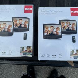 RCA 10" Dual Screen Mobile DVD System. 2 Available @ $70 each 
