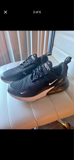 Classic Nike Air Max 270 sneakers. These are black with white accents