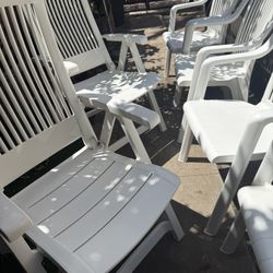 8 Plastic Chairs In Good  Working Conditions. All $50