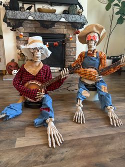 Skeleton farmer twins - play the guitar banjo together (sold together)
