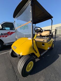 1995 EZGO Yellow Gas Powered Golf Cart