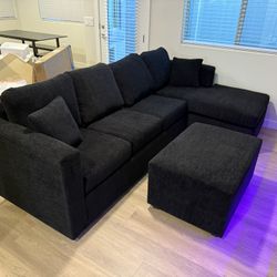 Brand New Black Sectionals With Free Ottoman 