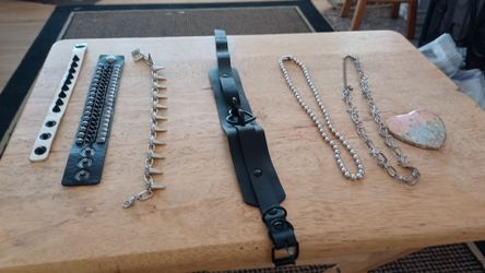 Wrist bands, necklaces, n button pin $2 to $5 each