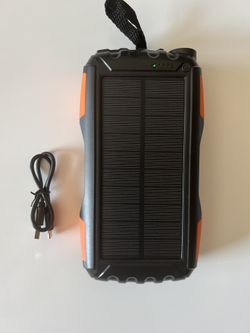 Power Bank Solare 42800mAh, Caricabatterie Portatile Con Torcia LED Super Luminosa, Doppia Uscita USB, Ricarica Rapida QC3.0, Impermeabile IP67, Arancione - 3