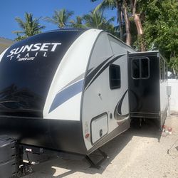 Travel Trailer 2019 In Excellent Condition  Crossroads Sunset 29 Feet With 1 Big Slide And Kitchen Outside