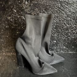 Short women’s black slip on boots