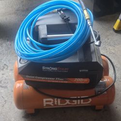Ridgid. Duel Tank Air Compressor/with Air Hose And Hose Attachments