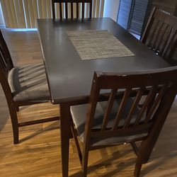 Dining table with chairs, seat covers, and Table Cloth