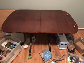 Old antique table wheels on the legs great condition