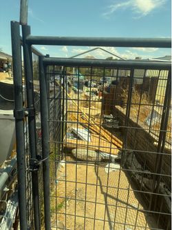 heavy-duty metal dog kennel or outdoor chicken run