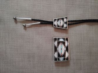 Zuni belt buckle and bolo set.