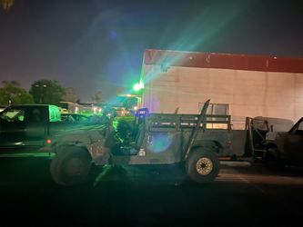 2005 hummvee 6.2 diesel Military-Style Utility Vehicle with Flatbed