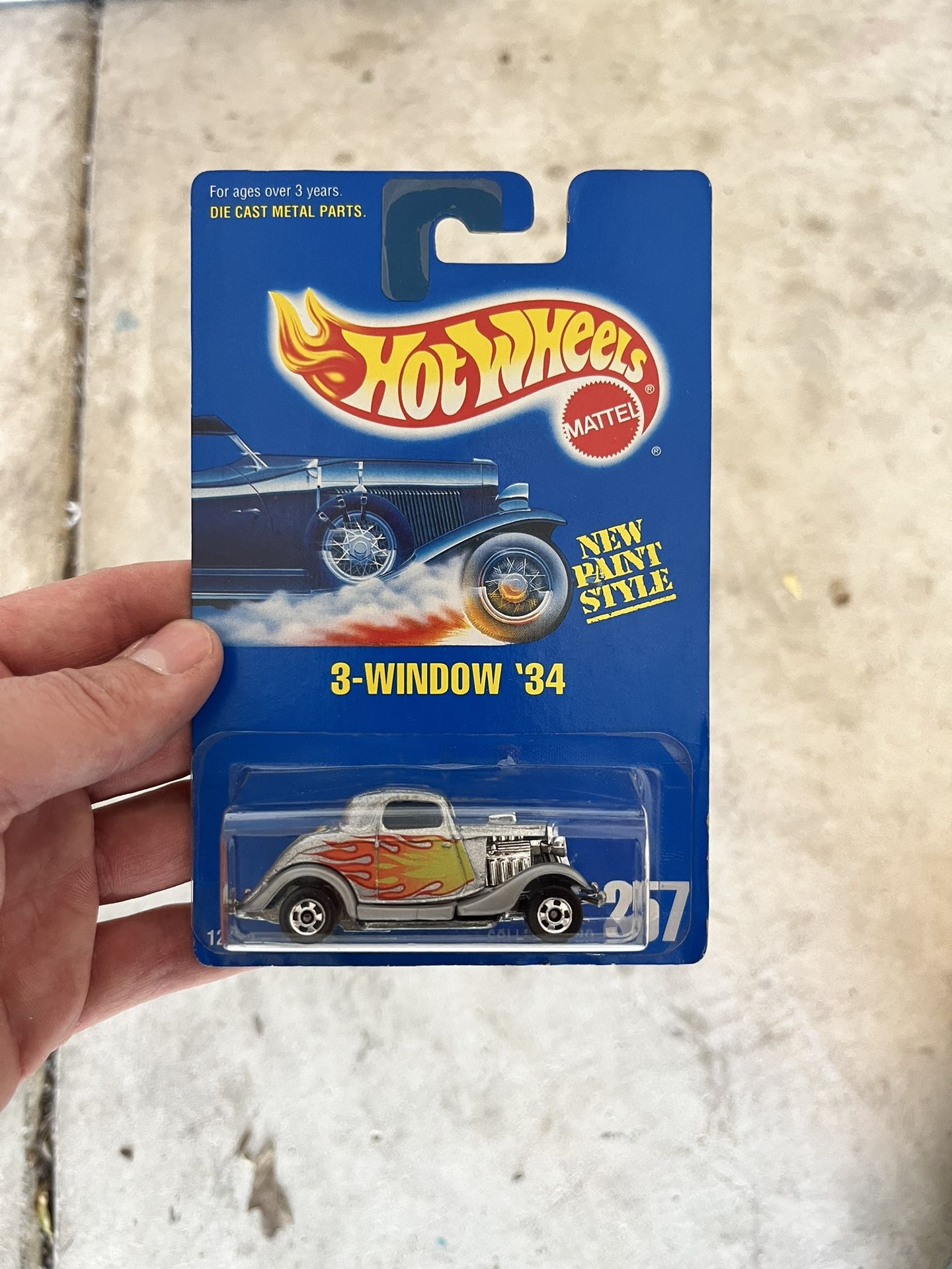 1991 Hot Wheels Blue/White Card New Paint Style #257 3-Window 34 Chrome 3 Spokes