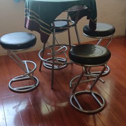 4 Hightop Chairs And Free Table 40.00