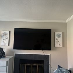 65 Inch Tv , Blue Chair, White And Gray Table , White Desk , 2 Night Stands And One Large Dresser 