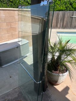 Shower doors 58 3/8 wide by 66 in tall (approx)