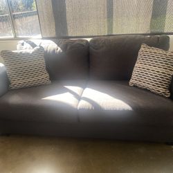 2 grey couches 