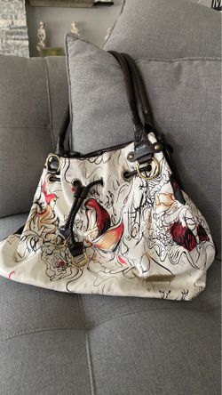 Brown and cream color faux leather purse