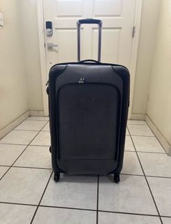 Large Black Rolling Suitcase – Checked Luggage