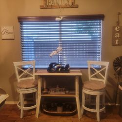 Farmhouse style bistro table set with two Barstool Chairs That Swivel
