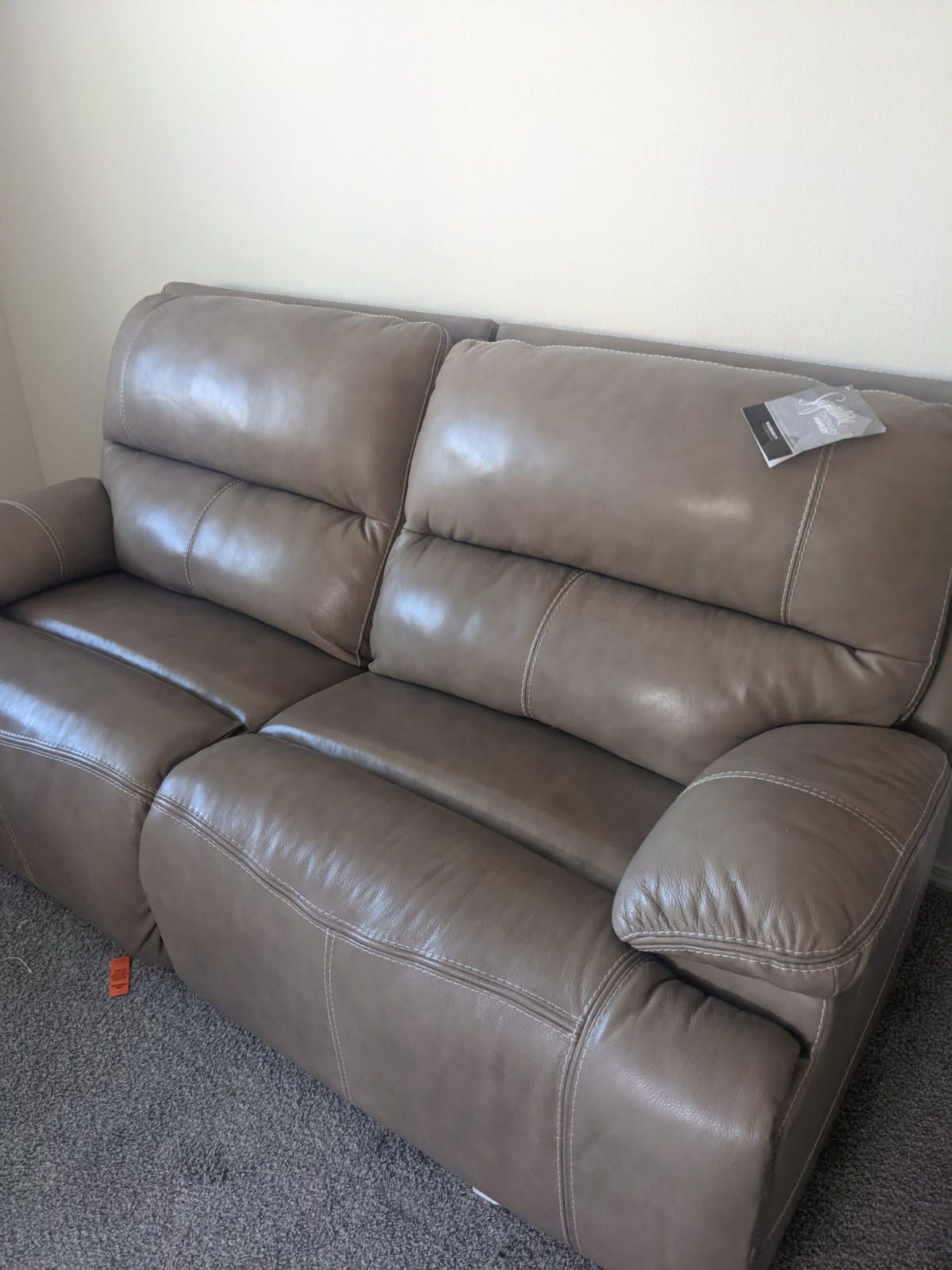 Ashley Has Oversized Leather Chair And Love Seat 
