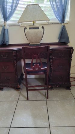 Antique desk and chair (also lamp)