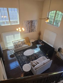 Living Room Set - Cream Sofa, Loveseat, Black Sofa + Oval Coffee Table