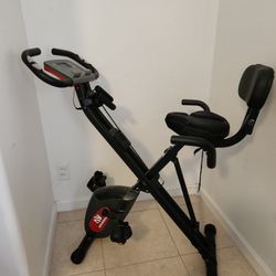 exercise bike (barely used)