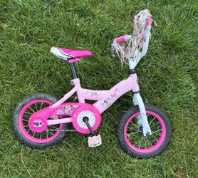 Huffy Disney Minnie Mouse 12” Girls Bike – Pink Training wheels are not included.