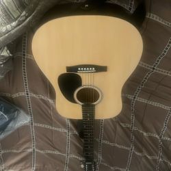Acoustic Guitar From Squier By Fender (willing To Trade For A 5 String Bass Guitar Or Electric Drum Set) 