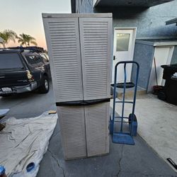 Black/Decker outdoor cabinet, has shelves, it has seen better days but can work for the right person