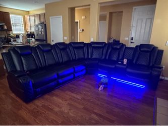 3 Piece  210” Breathing Leather Power reclining Theater  sectional