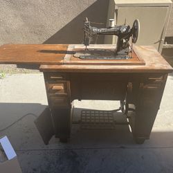 Sewing Machine Cabinet with treadle. White Brand  1950s or earlier