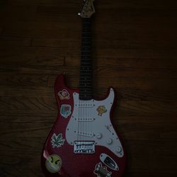 Red Squier by Fender Electric Guitar With Black Bag