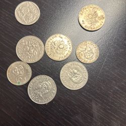  1974 Barbados 8-Piece Proof Set. This set includes eight coins, with two of them being made of silver. Proof coins are specially made early samples t