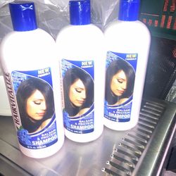 Hair vitalizar shampoo bottles
