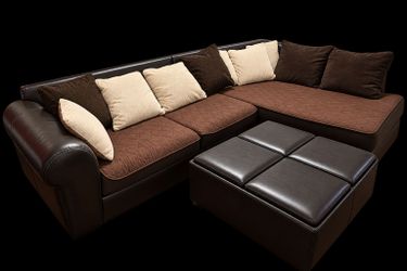 Brown leather Back L shape couch with Ottoman