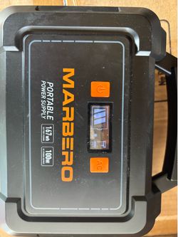 Open box like new protable power station with charger and 20w solar panels