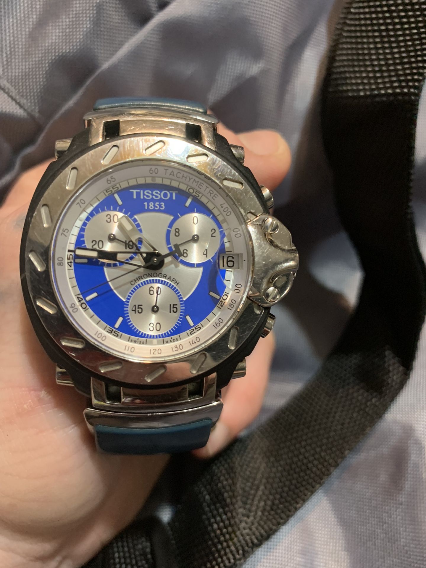 Tissot Watch Blue Band And Sapphire Crystals In The Silver Around Watch Face And Back