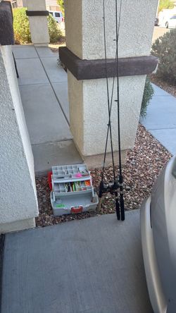 3  fishing rods and reels and a box