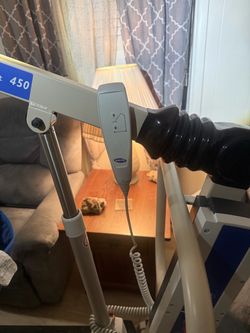 Like-new Invacare Reliant 450 Electric Patient Lift + Sling and Charger—1,150 OBO. Excellent condition
